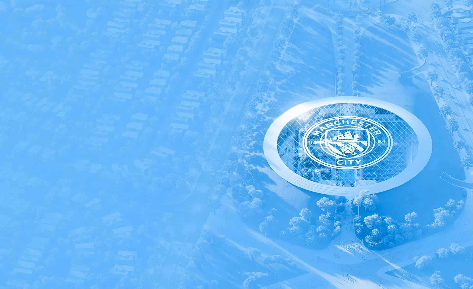 The Manchester City crest on the ground at the heart of the community, seen from the air